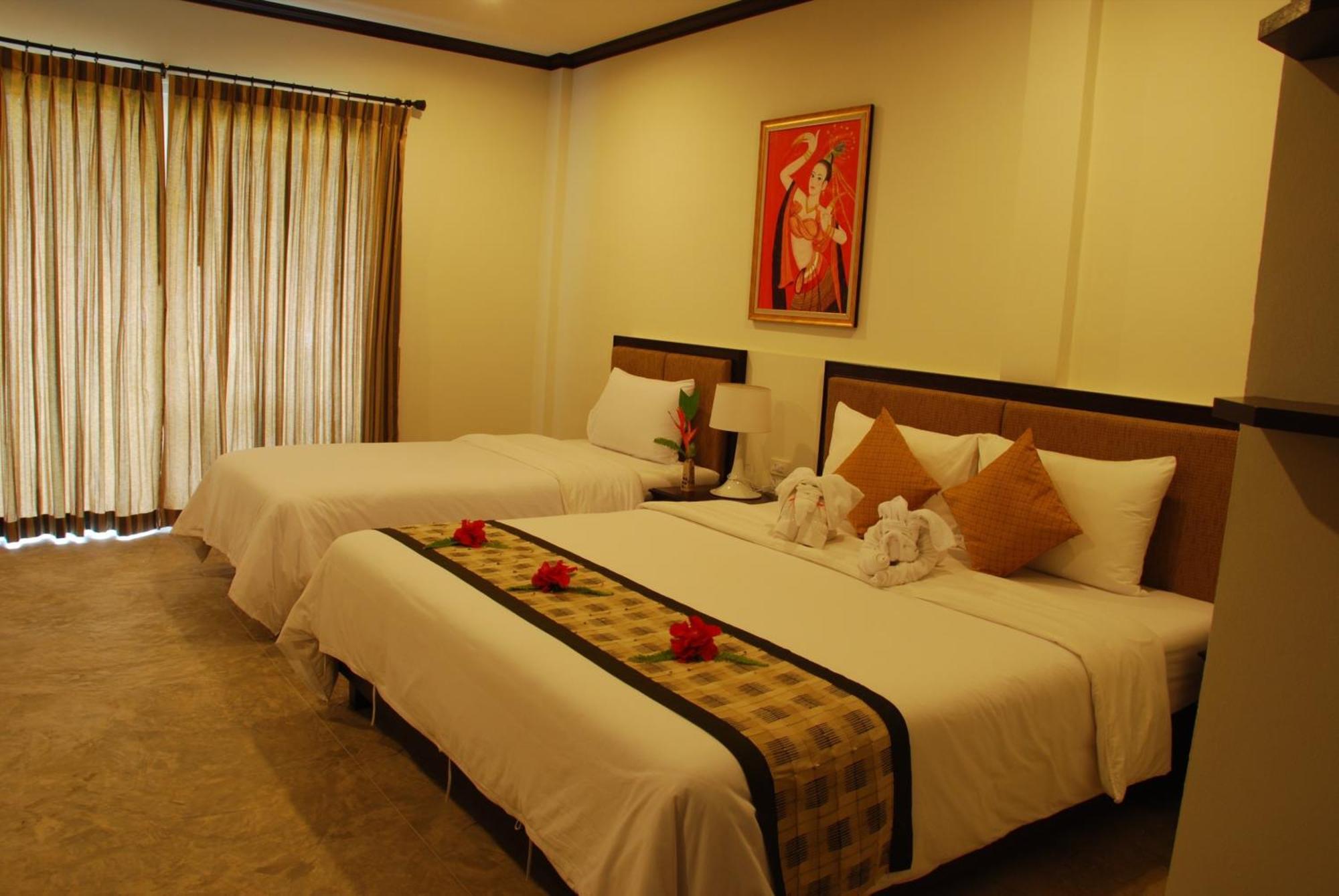 Deluxe Triple Room
